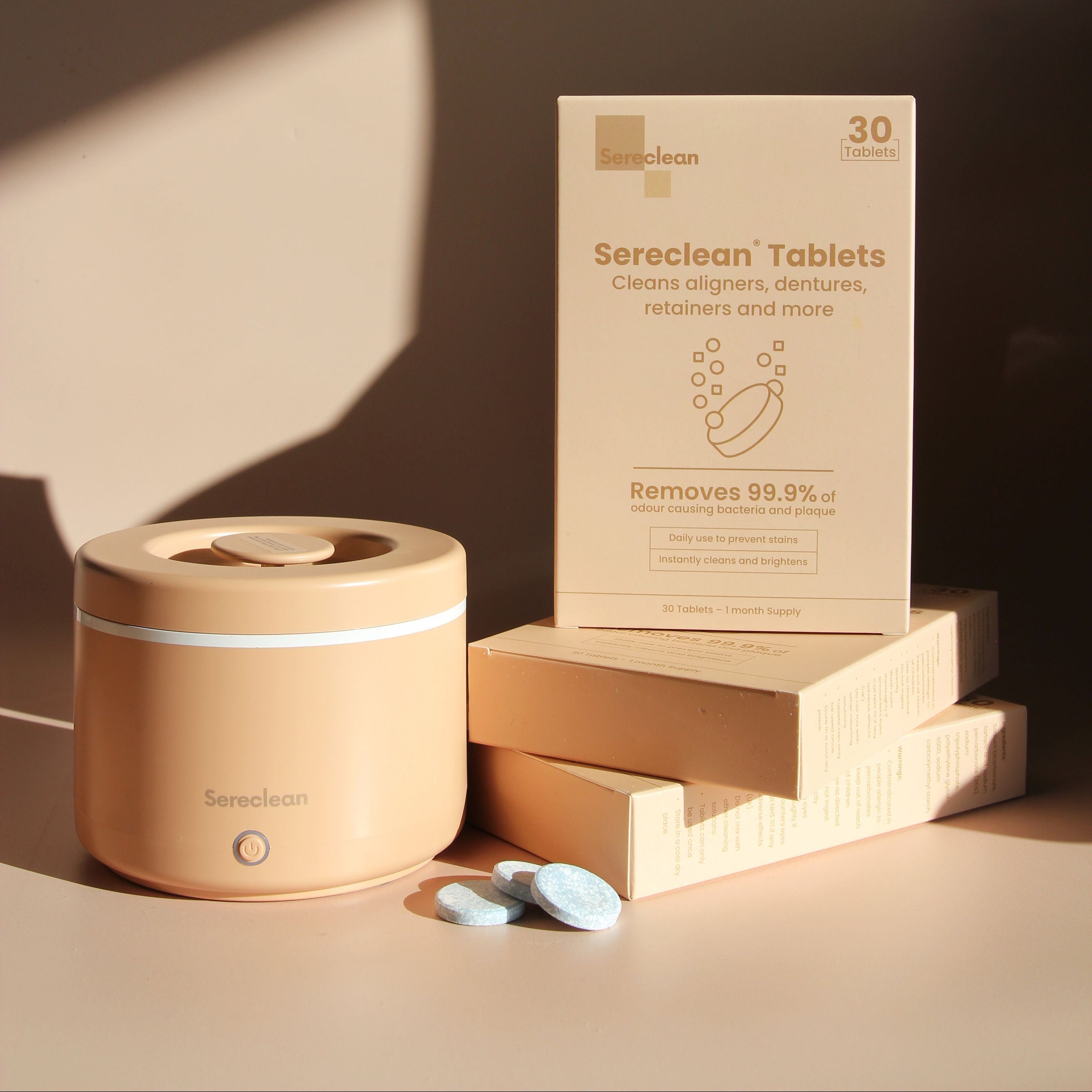 beige sereclean ultrasonic retainer cleaning pod with 3 boxes of retainer cleaning tablets